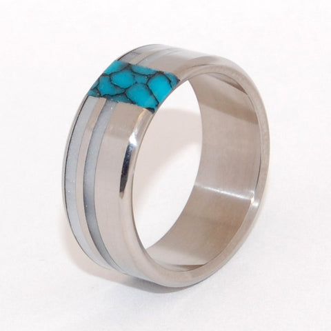 Innocent. Twin bands of glowing gray marbled opalescent are offset by turquoise, stunning against a titanium backdrop. A design well-suited for wider bands. Pictured at 9.5mm. 