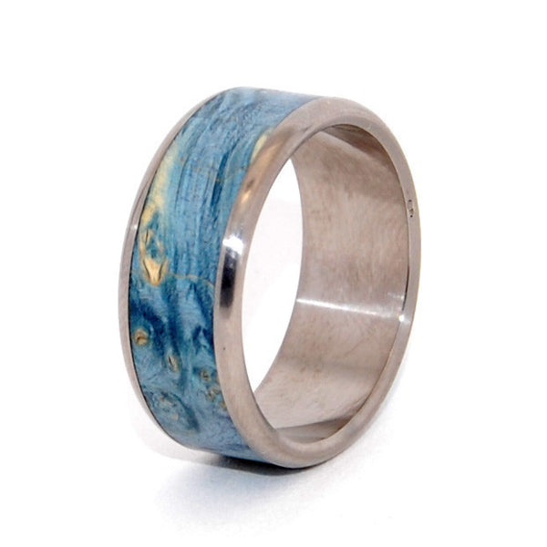 This beautifully crafted, titanium wedding ring has a center inlay of Blue Box Elder. Nicely polished with a mirror finish and fully rounded edges. Pictured at 10.5mm.
