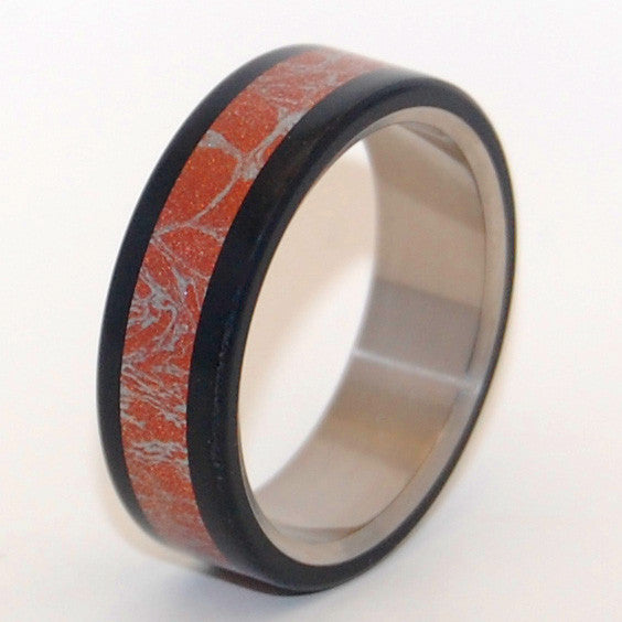 Akita features a center inlay of Red Silver M3 Mokume, bookended by Black resin. Flat edges